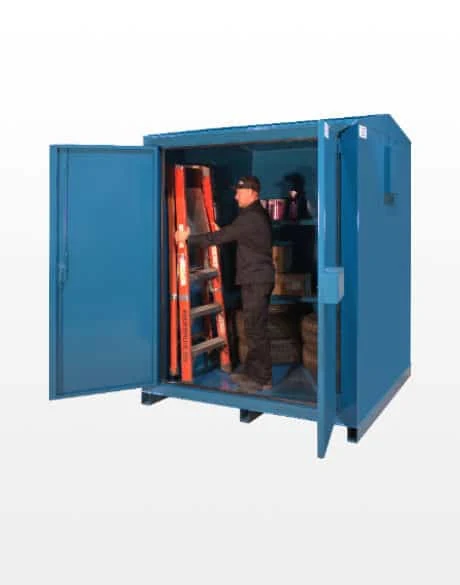 A blue Laurin steel storage cabinet with both doors open. A worker inside lifts a stepladder off the shelves.